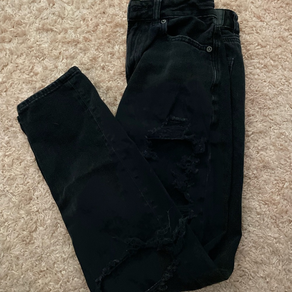 black ripped jeans